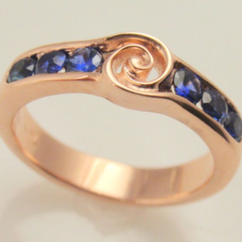 Custom Twist Center Sapphire Channel Ring